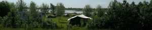 Header afbeelding overnachten midden in De Biesbosch, rustgevende campinglocatie in Nederlands natuurpark